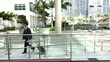 Young city businessman with travel luggage