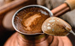 Photo: Fresh coffee in the pot and a spoon Fresh coffee in the pot and a spoon
