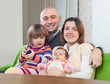 Happy parents with two children
