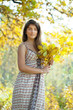   girl with oak leaves posy