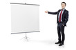 businessman pointing to a blank board on white background