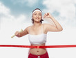 Woman crossing Finishing Line