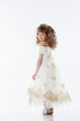 Photo: Smiling young princess posing in studio Smiling young princess posing in studio