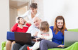 family of with various portable computers