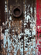 Old metal door handle on very old wooden door / Knocker