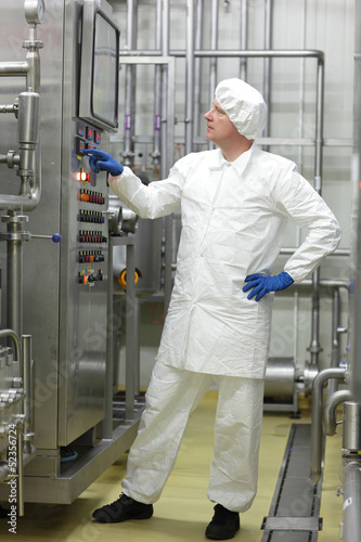 Photo: engineer controlling industrial process engineer controlling industrial process