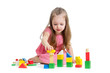 Photo: child girl playing with block toys over white background child girl playing with block toys over white background
