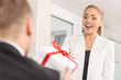 A man giving a gift