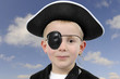 young boy in pirate costume, isolated on white