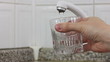 Fillig glass of mains water, drinking water