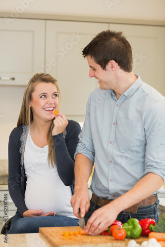 Photo: Man preparing vegetables for pregnant wife Man preparing vegetables for pregnant wife