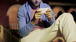 Happy man using smartphone in the evening, steadicam