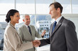 Businessman introducing a colleague