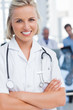 Photo: Young nurse with arms crossed Young nurse with arms crossed