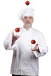 Photo: Cook juggles tomatoes Cook juggles tomatoes