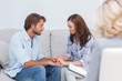 Couple reconciling on the couch