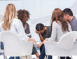 Photo: Psychologist taking notes while woman crying Psychologist taking notes while woman crying