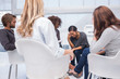 Photo: Woman crying at group therapy Woman crying at group therapy