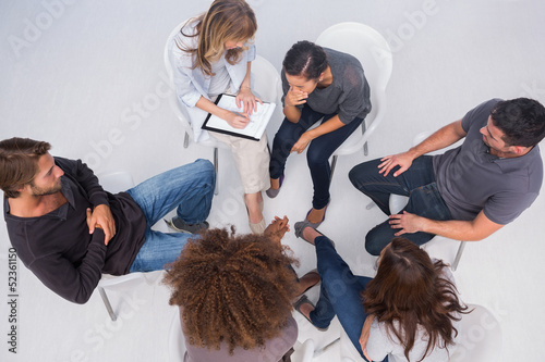 Photo: Therapist listening to patient Therapist listening to patient