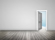 Foto: Doorway opening to blue sky in grey room Doorway opening to blue sky in grey room