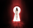 Foto: Businesswoman standing in the keyhole doorway Businesswoman standing in the keyhole doorway
