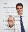 Photo: Smiling businessman writing in sql language Smiling businessman writing in sql language