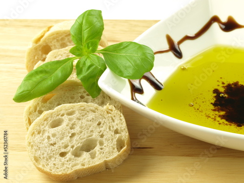 Photo: Baguette and oil Baguette and oil