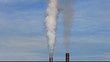 Factory smokestacks blowing fumes