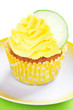 Lime cupcake with lemon cream, selective focus