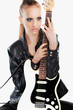 Beautiful rock girl holding a guitar