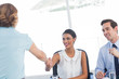 Attractive recruitment consultant shaking hand of an applicant