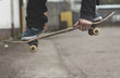 Skater grabbing his board mid air