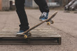 Skater doing manual trick on wooden crate