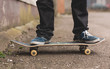 Skater standing on his board