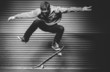 Skateboarder in mid ollie