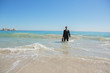 Businessman standing in the sea