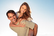 Man giving a piggy back to his girlfriend 