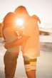 Lovers embracing each other on the beach