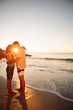 Cute lovers embracing each other on the beach