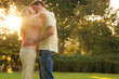 Beautiful couple kissing in a park