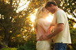 Pretty couple embracing in a park