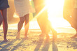 Close up of Legs of people on the beach