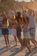 Group of friends dancing together