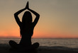 Shadow of woman doing yoga