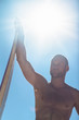 Attractive man holding surfboard