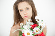 Seductive young woman standing topless