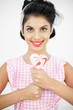 Pretty young pinup holding a lollipop