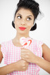Sexy pinup holding a lollipop