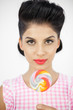 Pretty young pinup with a lollipop