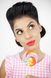 Cute young pinup with a lollipop